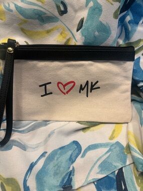 Michael Kors Cream Canvas Wristlet with Black Trim and Red Heart